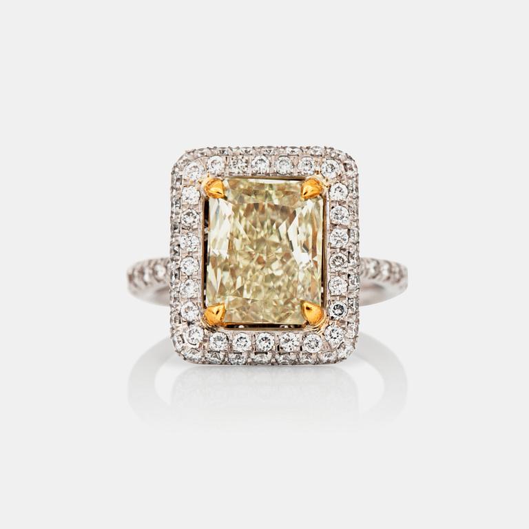 A 3.02 ct radiant-cut Fancy Yellow/VVS2 ring. Certificate from HRD.