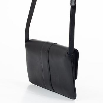 Gucci, a handbag.