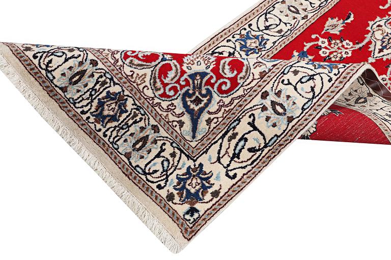 A runner carpet, Nain, part silk, 9 laa, c. 378 x 84 cm.