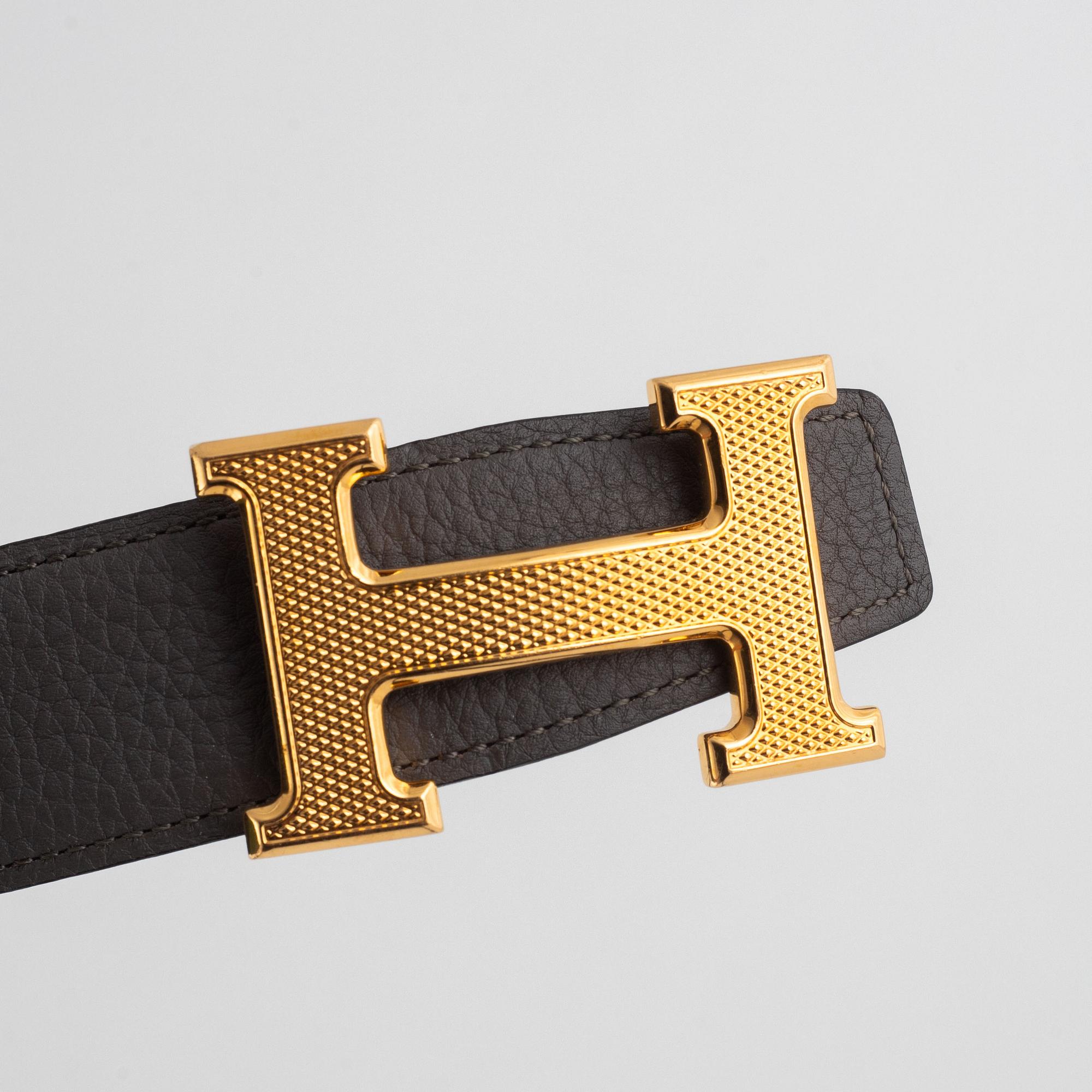 Hermès, belt, "H Guillochee belt buckle & reversible leather strap".