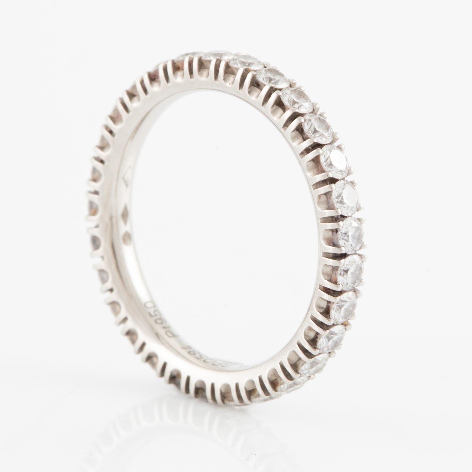 Cartier eternity ring in platinum with round brilliant-cut diamonds.