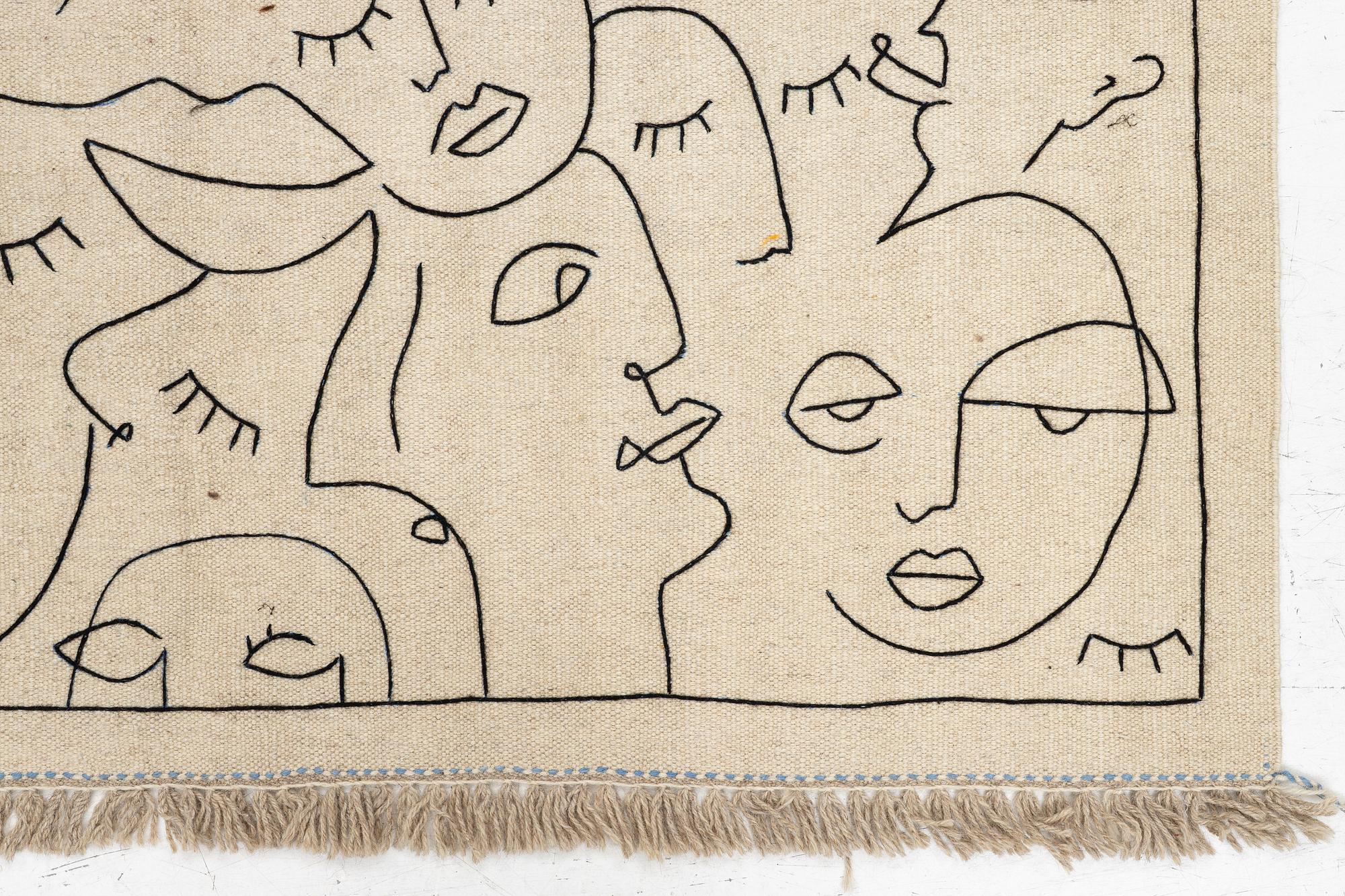 A hand-embroidered Kelim carpet, 203 x 148 cm.