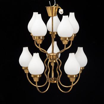 A brass and glass ceiling lamp for ten lights, first half 20th century.