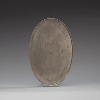 A pewter tray with incised portrait of the Tang poet Li Bai (701-762), late Qing dynasty (1644-1912).