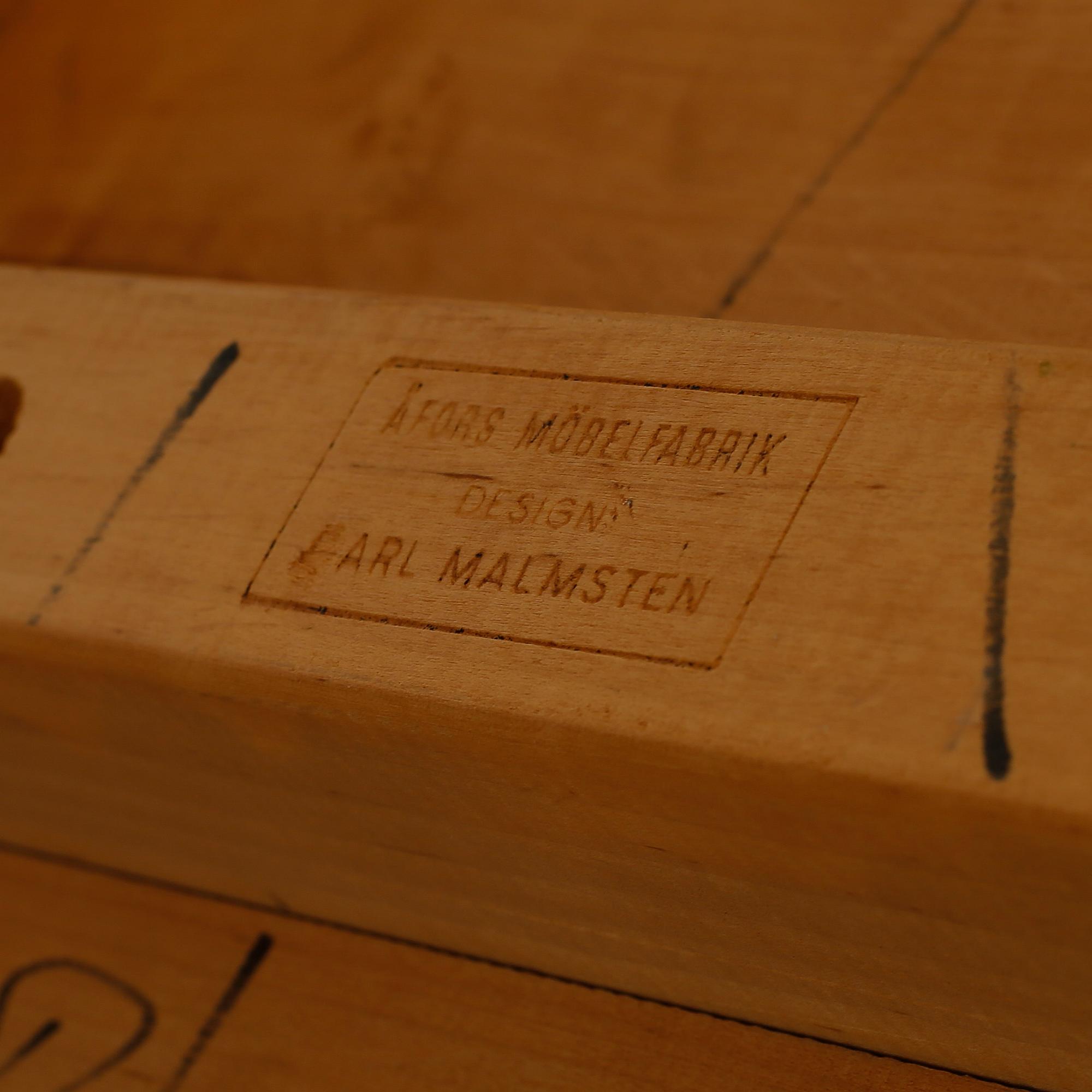 A dinner table by CARL MALMSTEN, "Calmare Nyckel", second half of the 20th century.