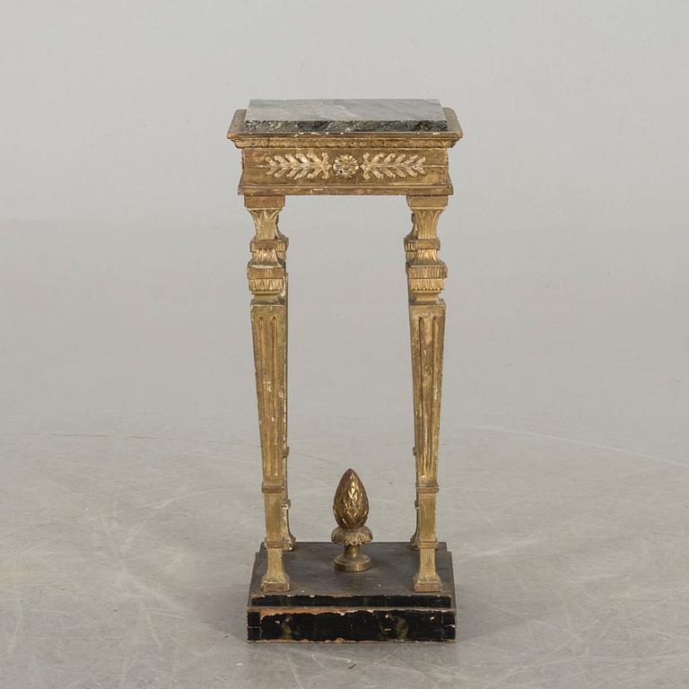 A Louis XVI-style pedestal later part of the 19th century.