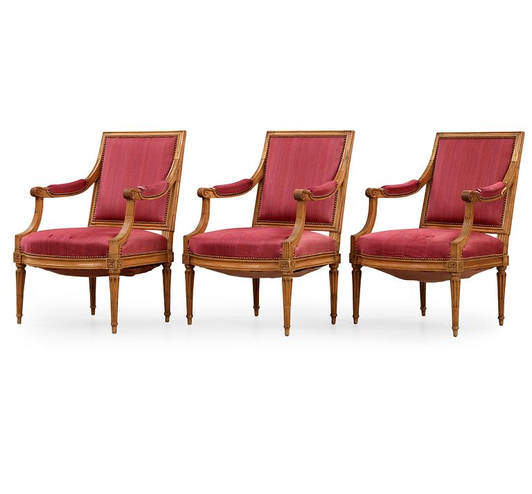 Three Louis XVI late 18th century armchairs.