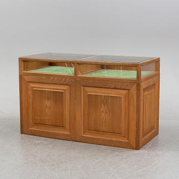 An oak shop counter.