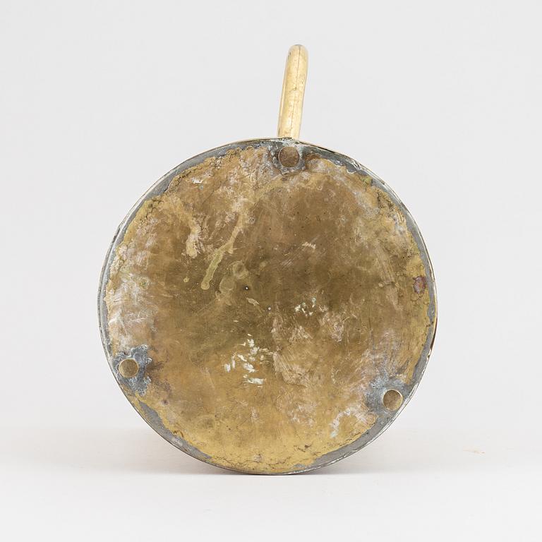 A 19th century brass champagne cooler.