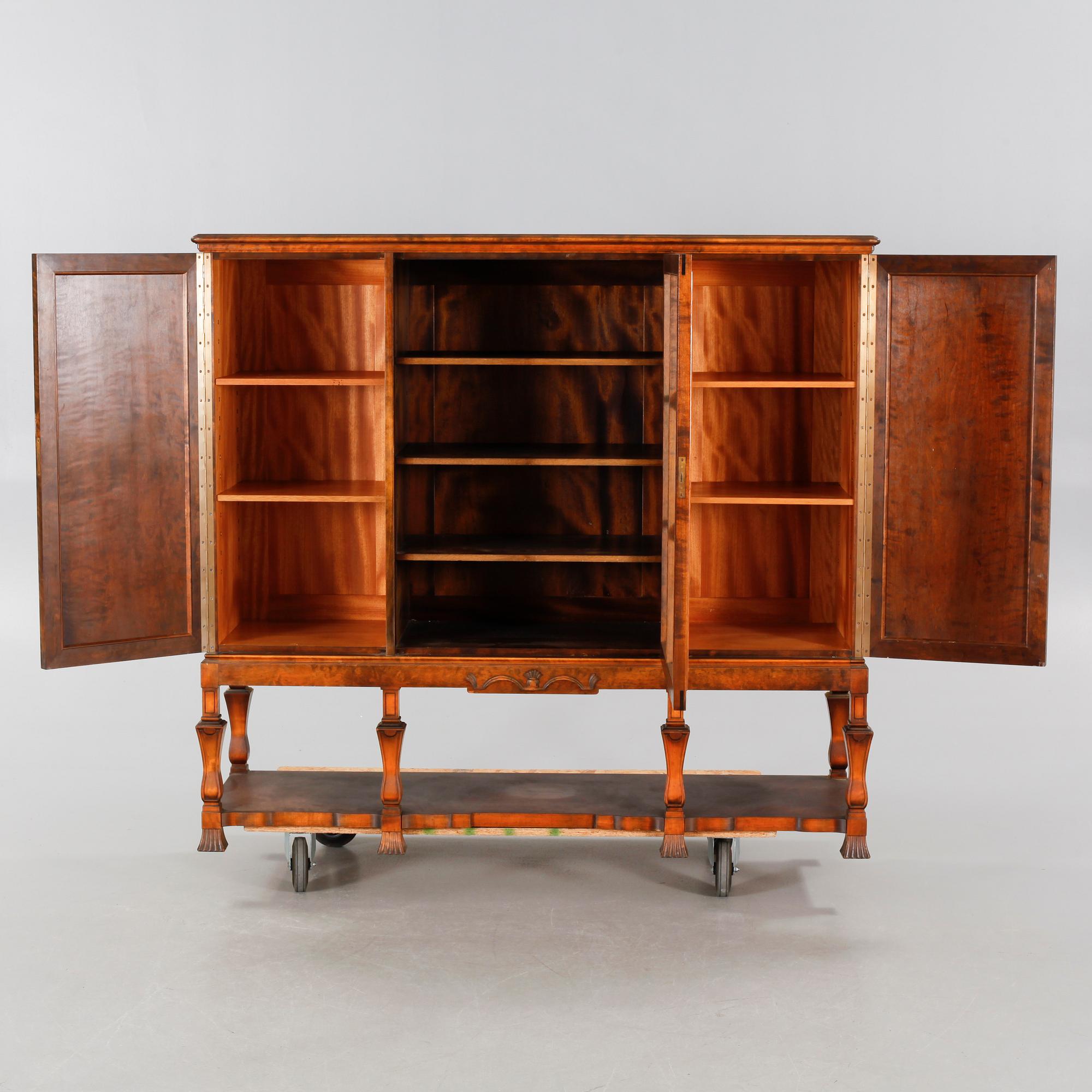 A 1920/30s swedish grace cupboard, model "Sture", made by AB Seffle Möbelfabrik.