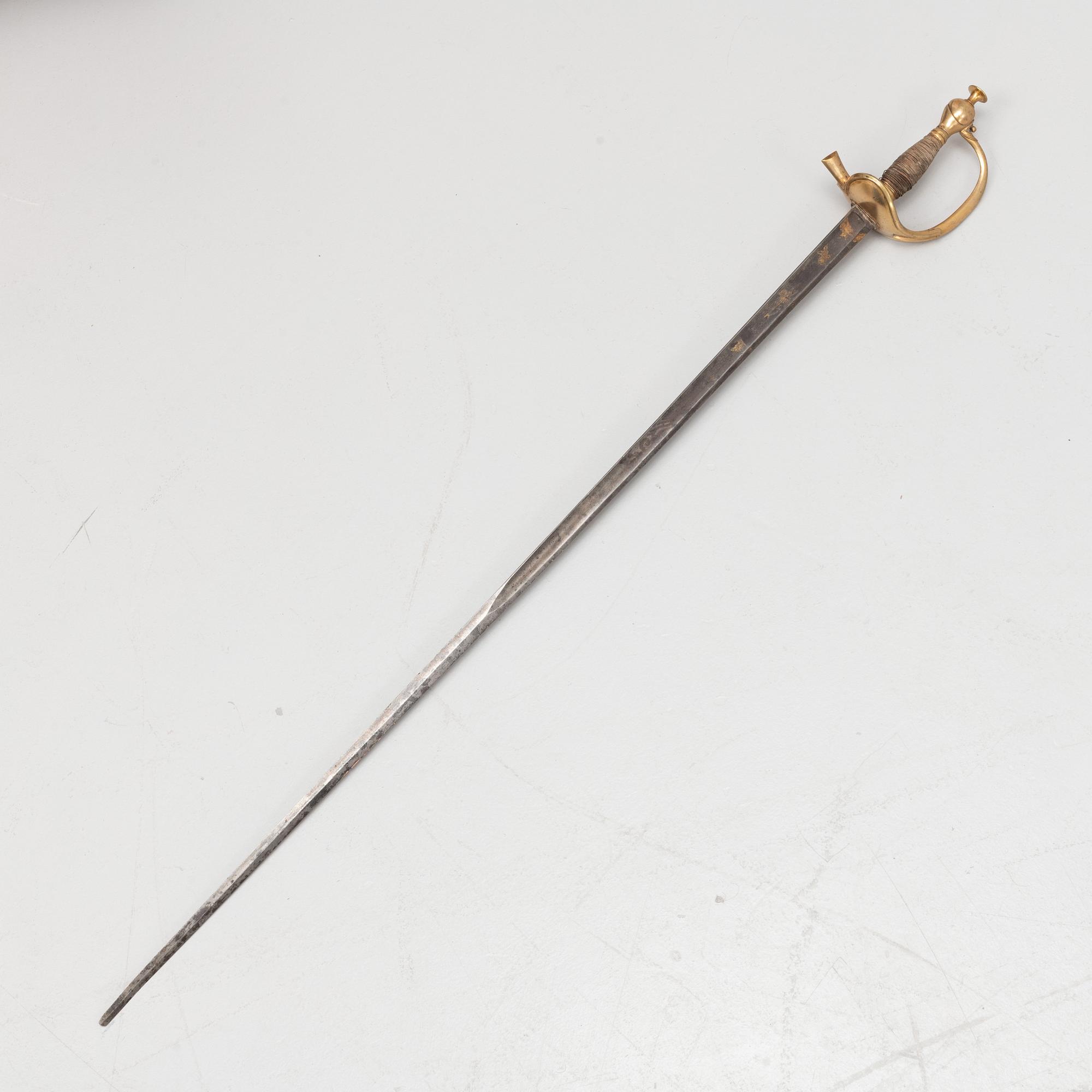A British officer's sword, with boat shell guard, early 19th Century.