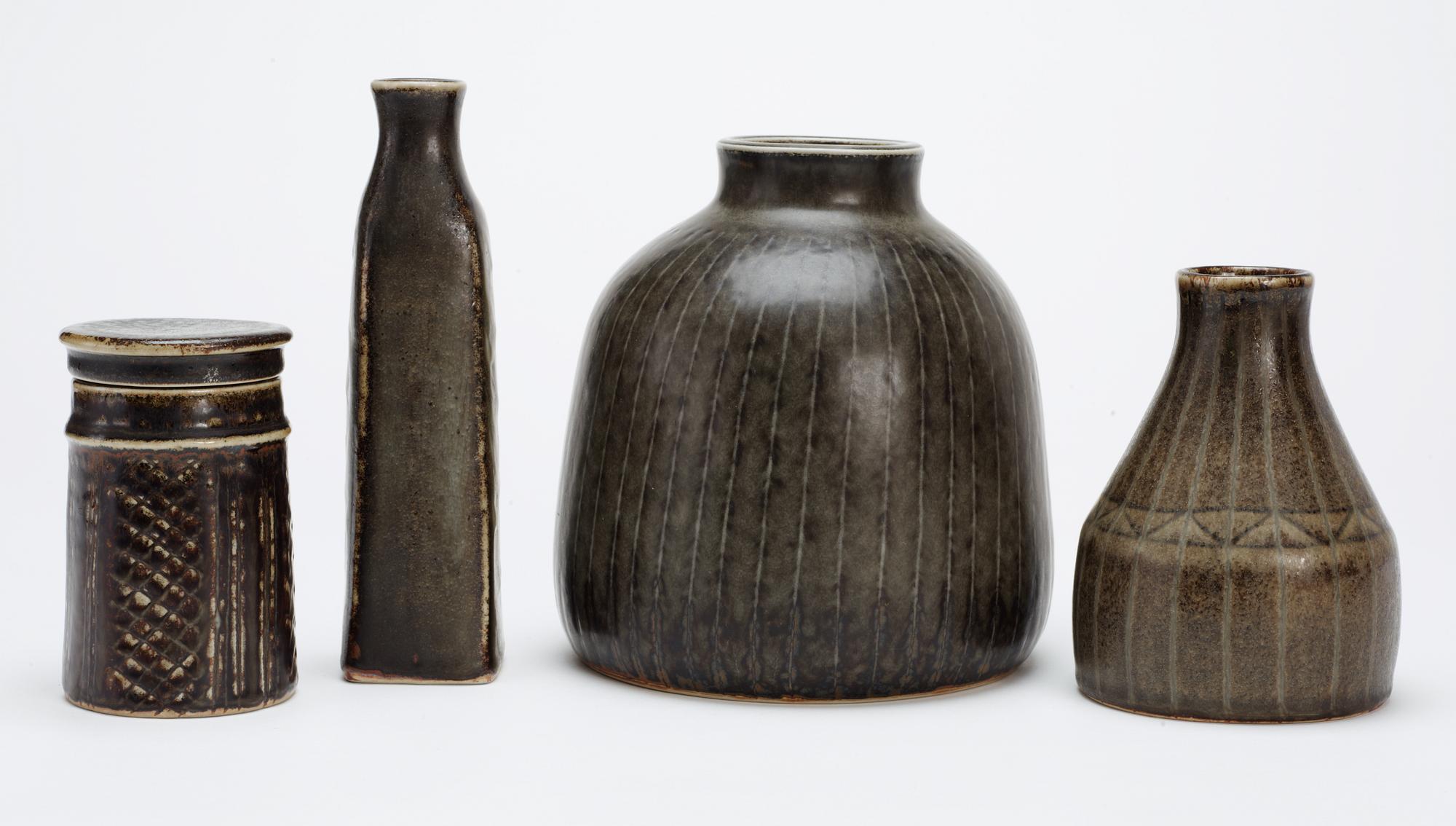 A Carl-Harry Stålhane stoneware lidded jar and three vases, Rörstrand.