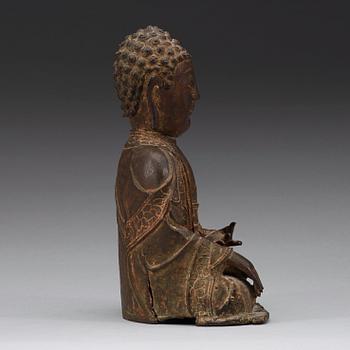 A bronze figure of a seated Buddha, Ming dynasty (1368-1644).