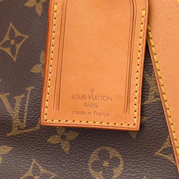 A Keepall Bandouliere 55 WEEKEND BAG by Louis Vuitton.