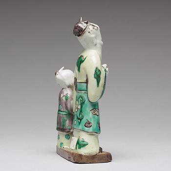 A famille verte bisquit figure of Laozi and a servant, Qing dynasty, 18th Century.