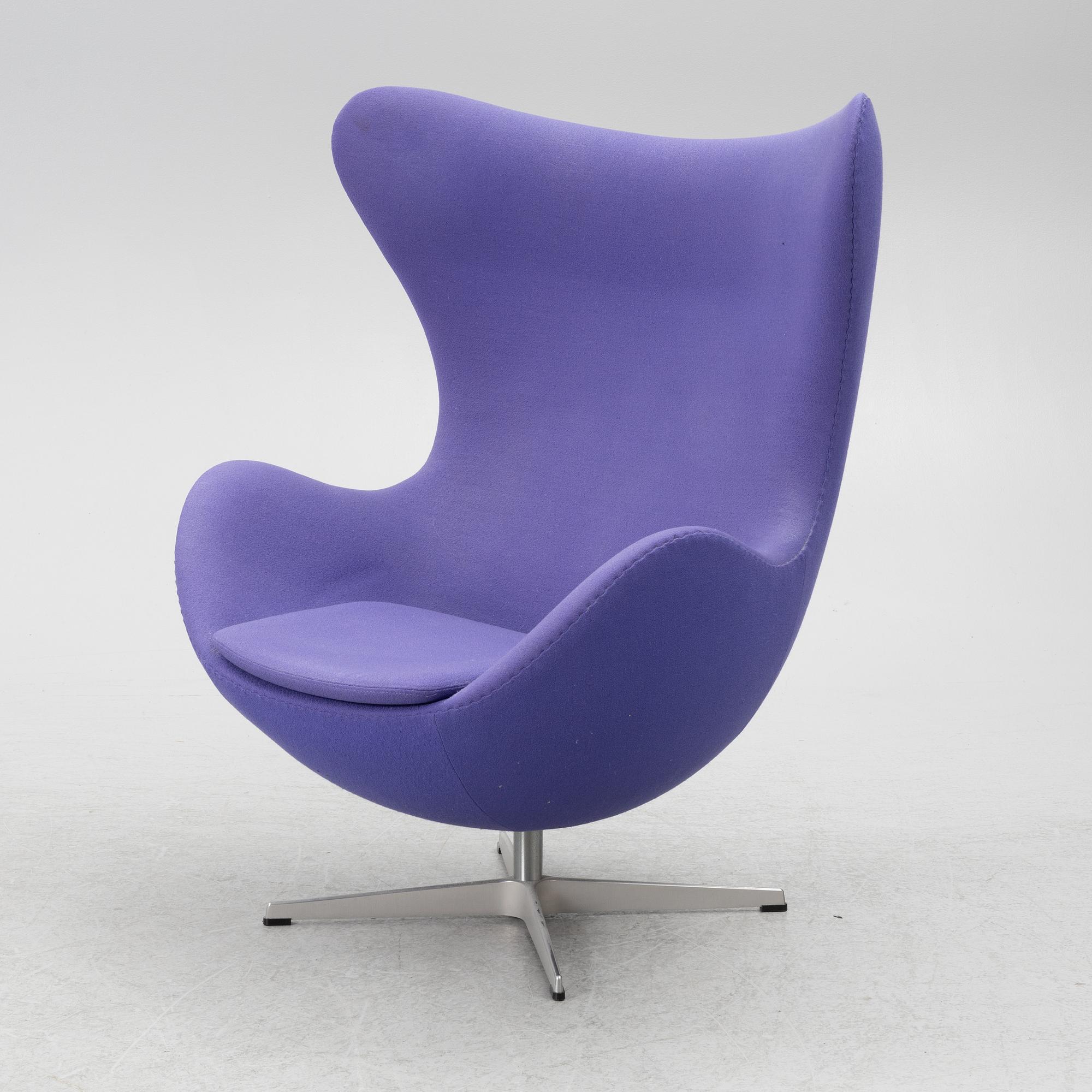 Arne Jacobsen, an armchair with footstool, "The Egg", Fritz Hansen, Denmark, 2003.