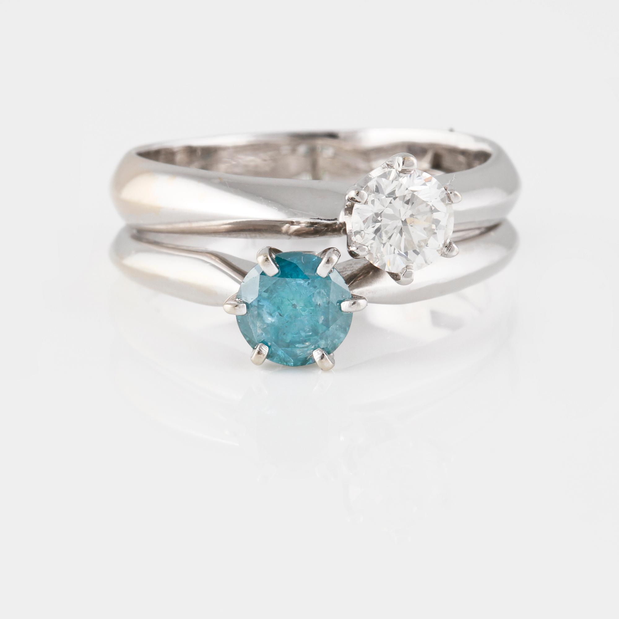 RING, 14K vitguld med 2 briljantslipade diamanter ca 1.20 ct. Vikt 7,7 gram.