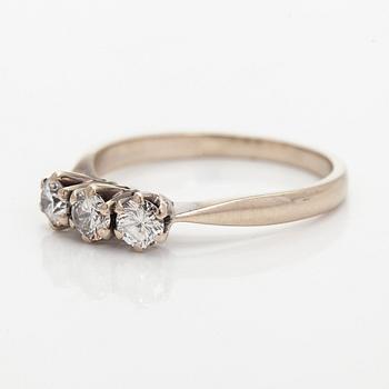 Ring, three brilliant cut diamonds, 18K white gold, H. Lahtinen & Co., 1985.