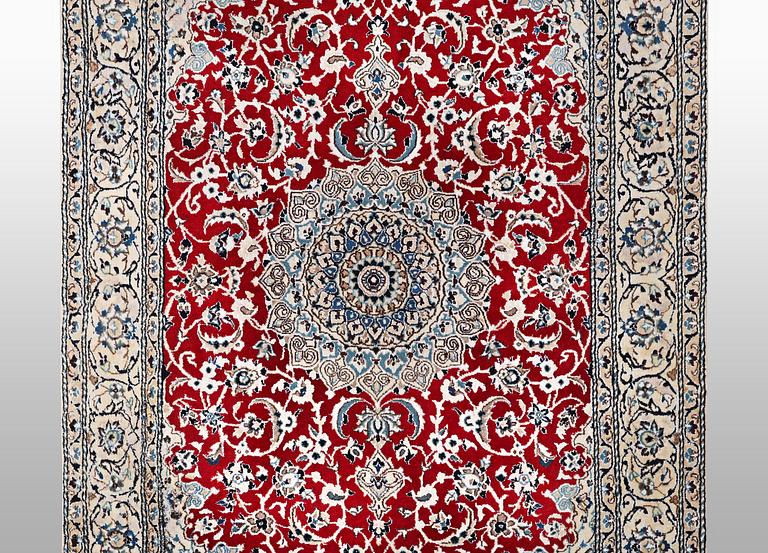 A rug, Nain, part silk, 9 LAA, ca 240 x 150 cm.