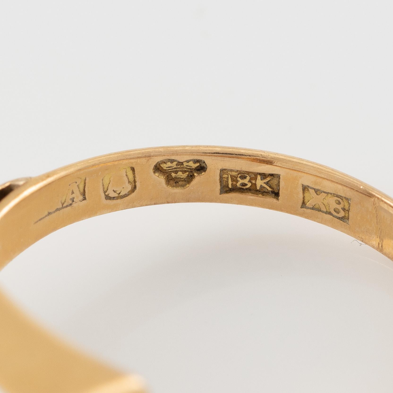 Ring 18K gold with rock crystal.