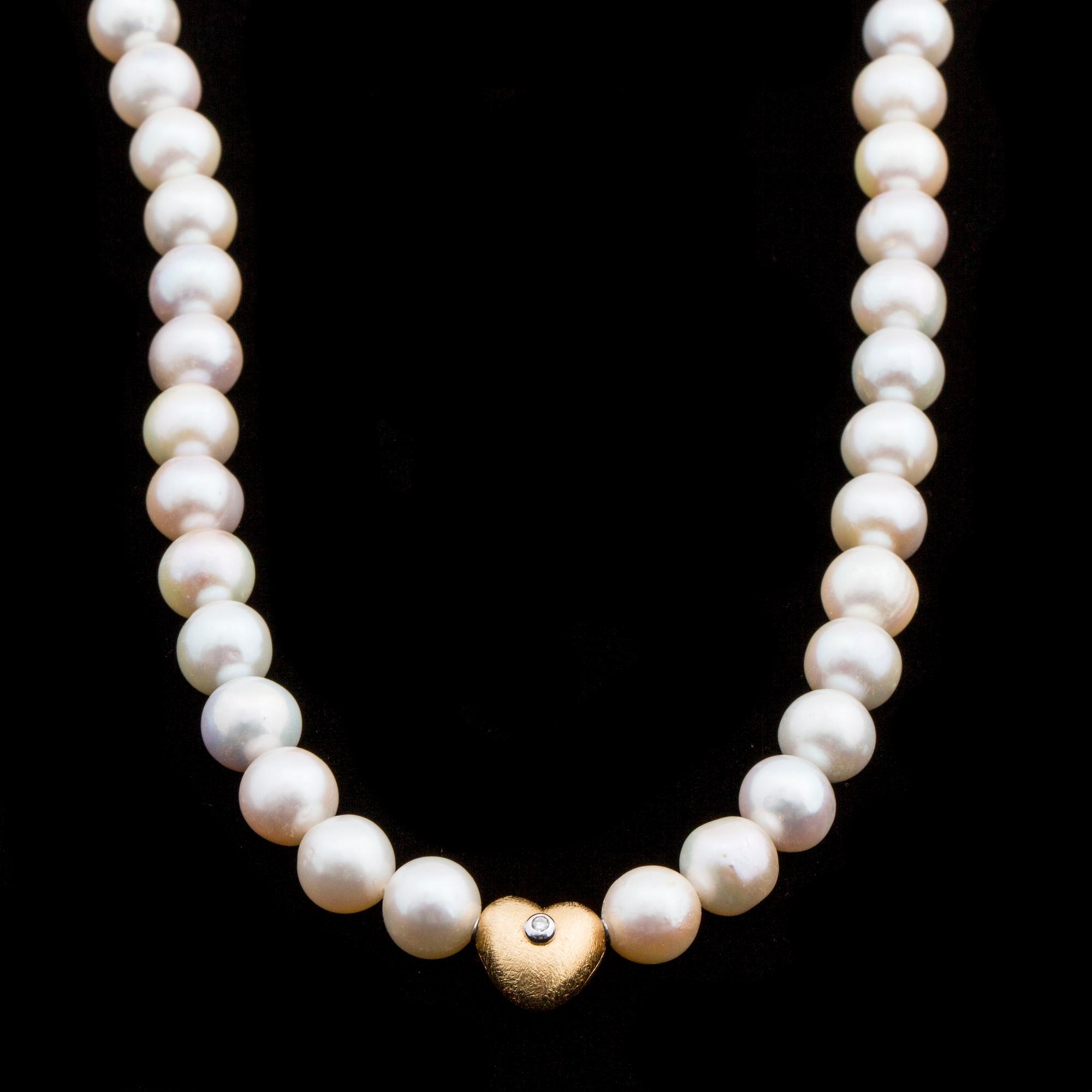 Ole Lynggaard collier with fresh water pearls and 18K gold clasp with brilliant-cut diamond ca 0.03 ct.