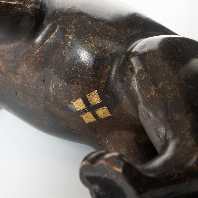 A decorative bronze sculpture, Fyrklövern.