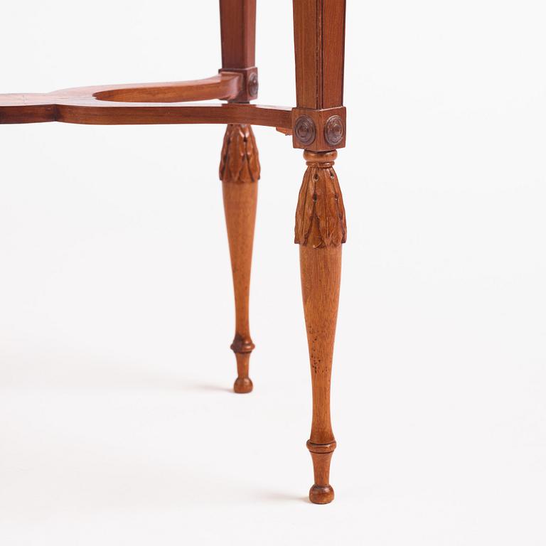 A late Gustavian mahogany table attributed to L. Qvarnberg (master in Stockholm 1801-1813).