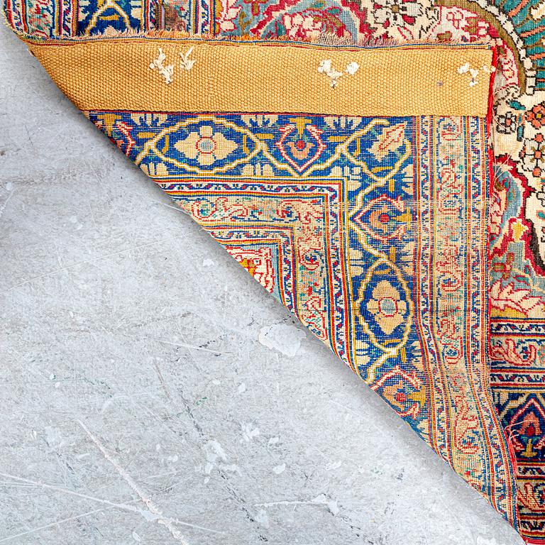 An antique Turkish /Hereke) signed carpet ca 200x121 cm.
