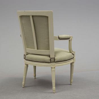 A 19th century Louis XVI style armchair.