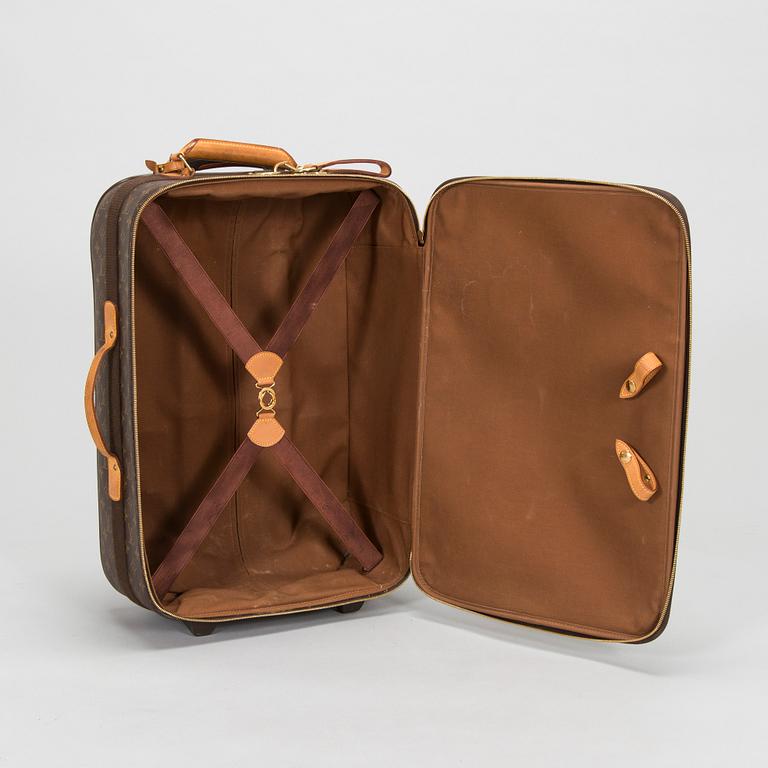 Louis Vuitton, a Monogram Canvas "Pegase 55" suitcase.