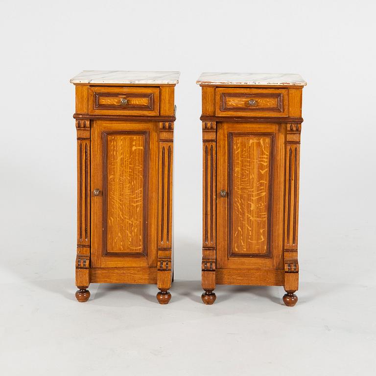 A pair of Neo Renaissance  bedside tables.