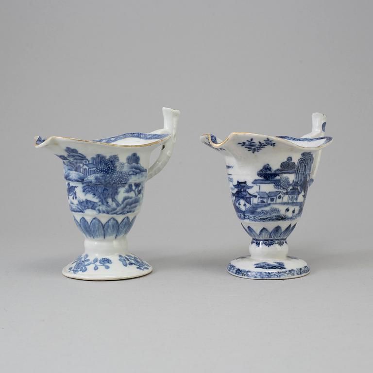 Two Chinese blue and white export porcelain jugs, Qing dynasty, Qianlong (1736-95).