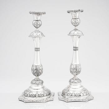 A pair 19th century Russian silver candlesticks, unidentified maker's mark, possibly Dimitry Agafanov (Kirov).