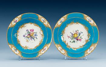 A pair of French Sèvres 'bleu celeste ground' soup dishes, 18th Century.