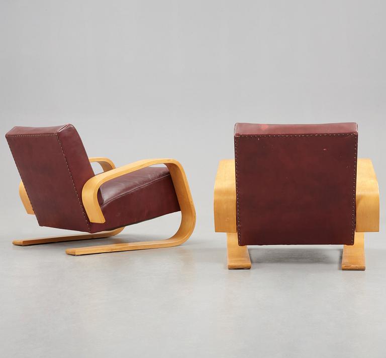 Alvar Aalto, A pair of Alvar Aalto tank easy chairs, model 400 probably by Huoneakalu-ja Rakennustyötehdas Oy, Finland, for Artek,