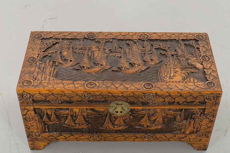A late 20th Century Oriental Carved Camphor Wood Chest.