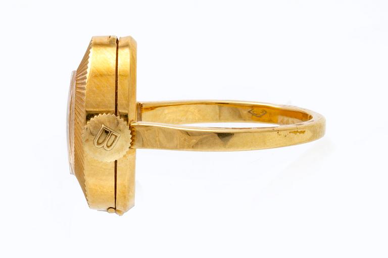 Bucheron, ring / klocka 18K.