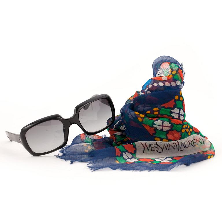 YVES SAINT LAURENT, a pair of sunglases and a silk scarf.