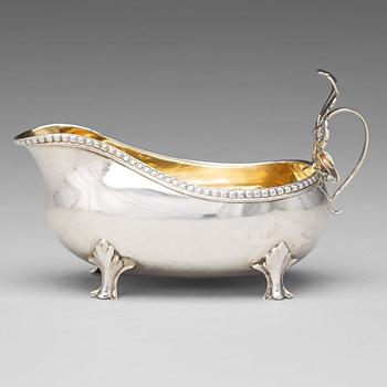 158. A Swedish Rococo parcel-gilt silver cream-jug, mark of Petter Åkerman, Stockholm 1778.