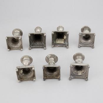 7 pewter candlesticks, 19th Century. (2+2+2+1).