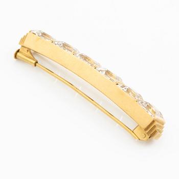 Wiwen Nilsson, a brooch, 18K gold with faceted rock crystal, Lund 1942.