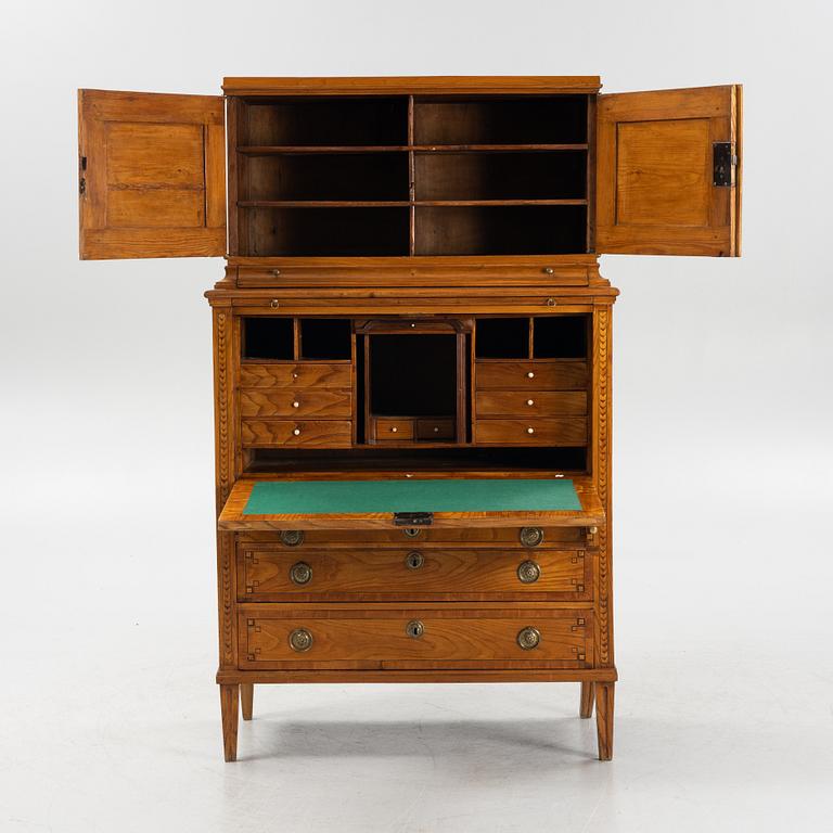 A French elm veneered secretaire, 19th Century.