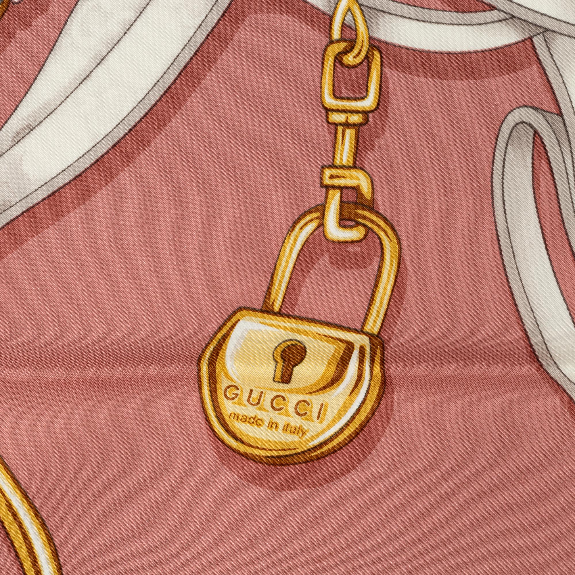 Gucci, a silk scarf.