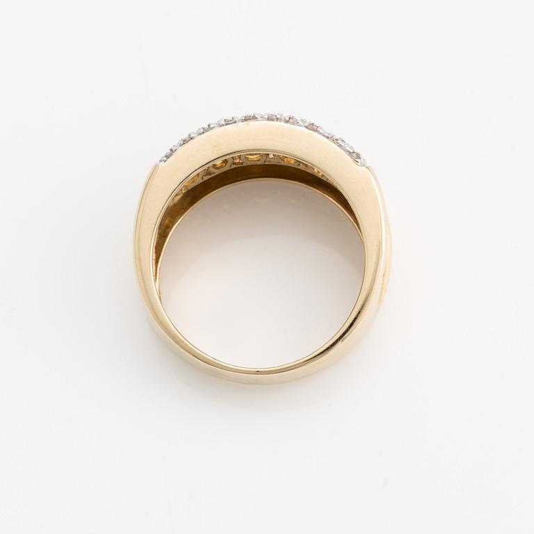 Ring, 14K guld med små diamanter och gula färgade stenar.