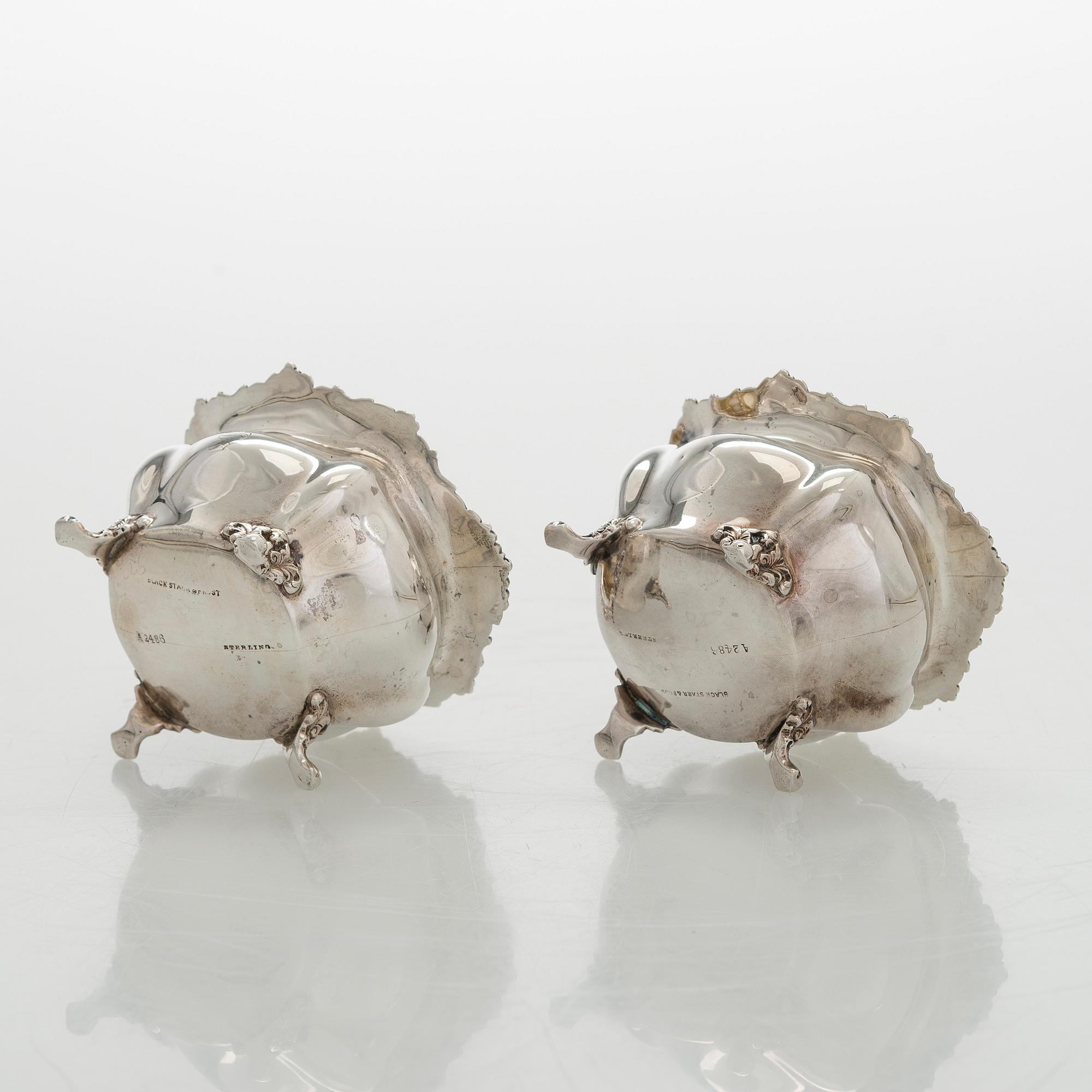 Black Starr & Frost, a pair of sterling silver shakers and sugar bowls, USA around 1900, Gorham pair of sterling spoons.