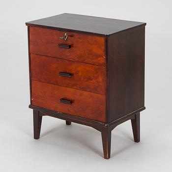 A 1930s functionalist style chest of drawer.