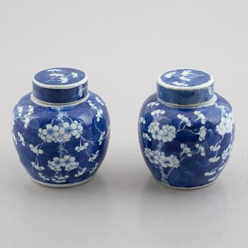 A pair of blue and white pots with covers, China, late Qing dynasty.