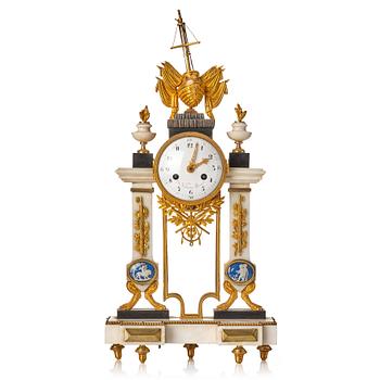 106. A Louis XVI 18th century mantel clock.