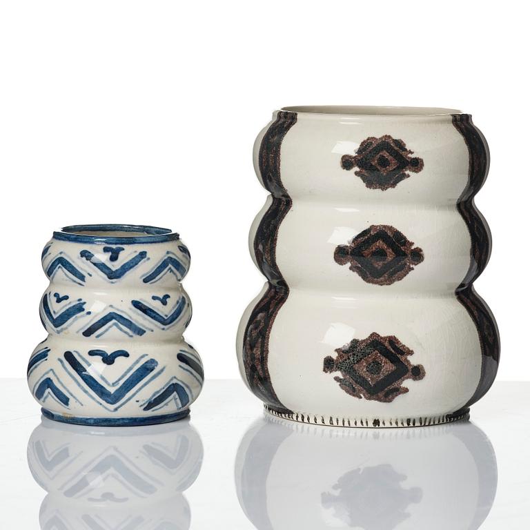 Wilhelm Kåge, a jar with cover, and four vases, creamware and porcelain, Gustavsberg, Sweden, 1917-1920.