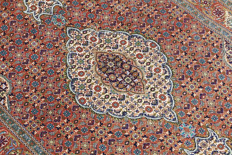 A carpet Tabriz, part silk , so called 50 Radj, ca 160 x 104 cm.